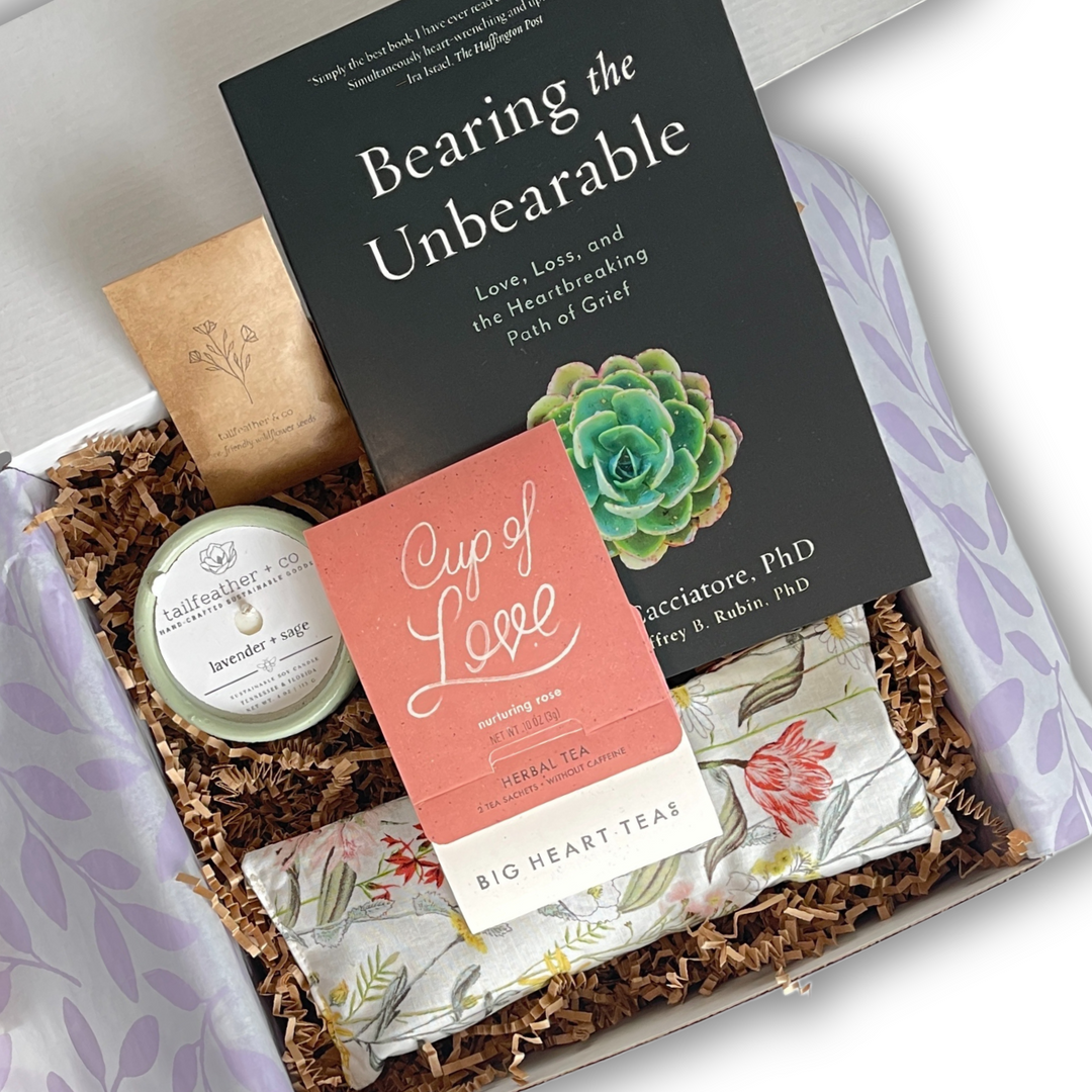 Grief Care Package with book, candle, tea, and weighted eye mask
